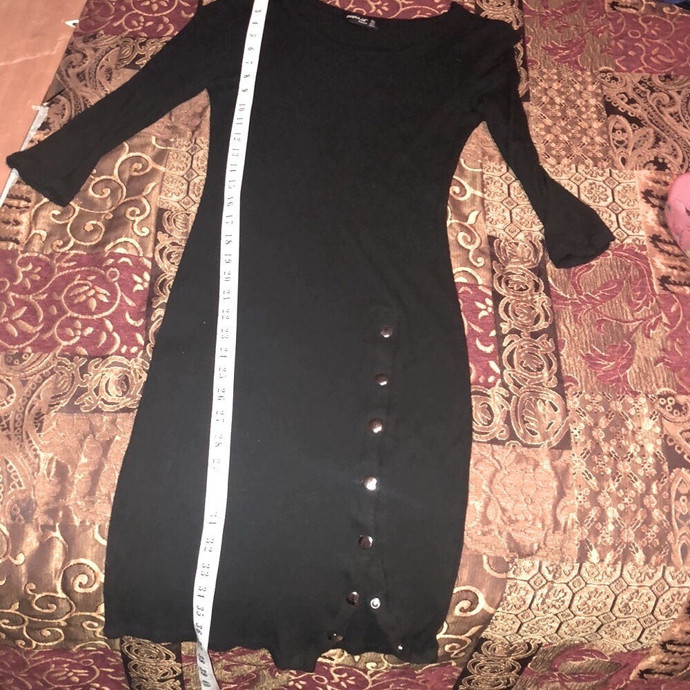Black Stretch lightweight sweater-dress w/16” of Snaps/Side Slit. EUC